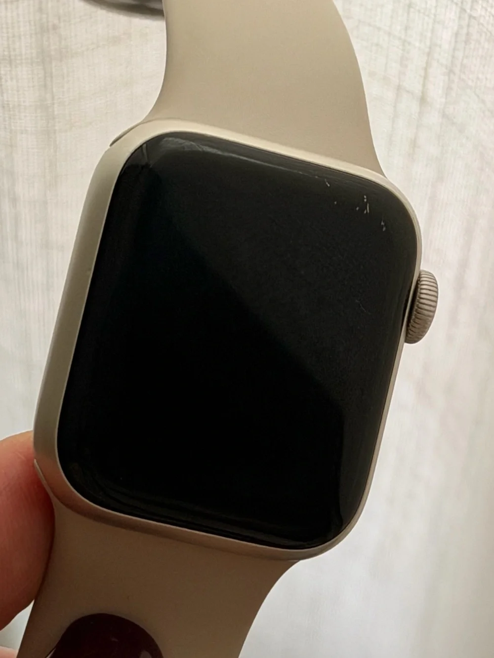 Apple Watch SE + cellular with Cream Sport Band